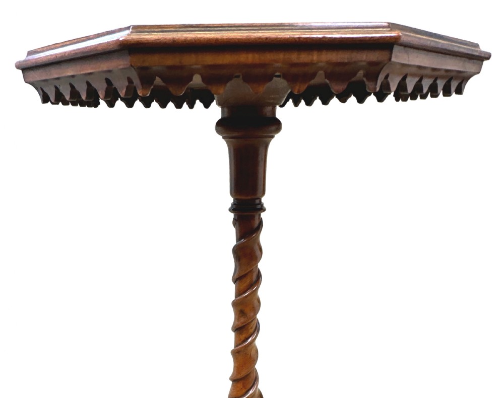 A Victorian walnut occasional table featuring an octagonal top, a barley twist central column, and carved tripod legs. View III