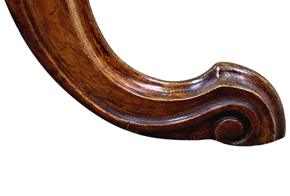 A Victorian walnut occasional table featuring an octagonal top, a barley twist central column, and carved tripod legs. View VII