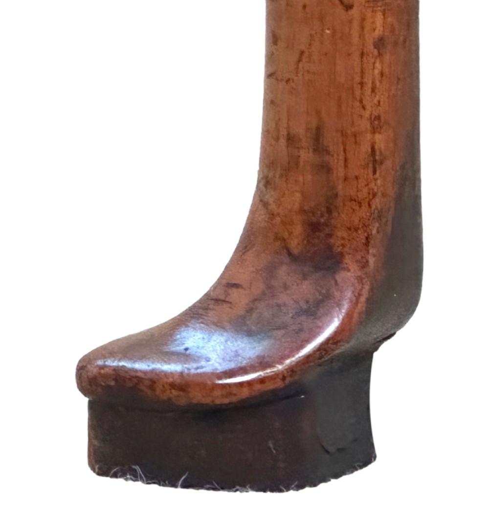 An 18th-century Georgian walnut lowboy table with three drawers, brass drop handles, a carved apron, and cabriole legs. View V