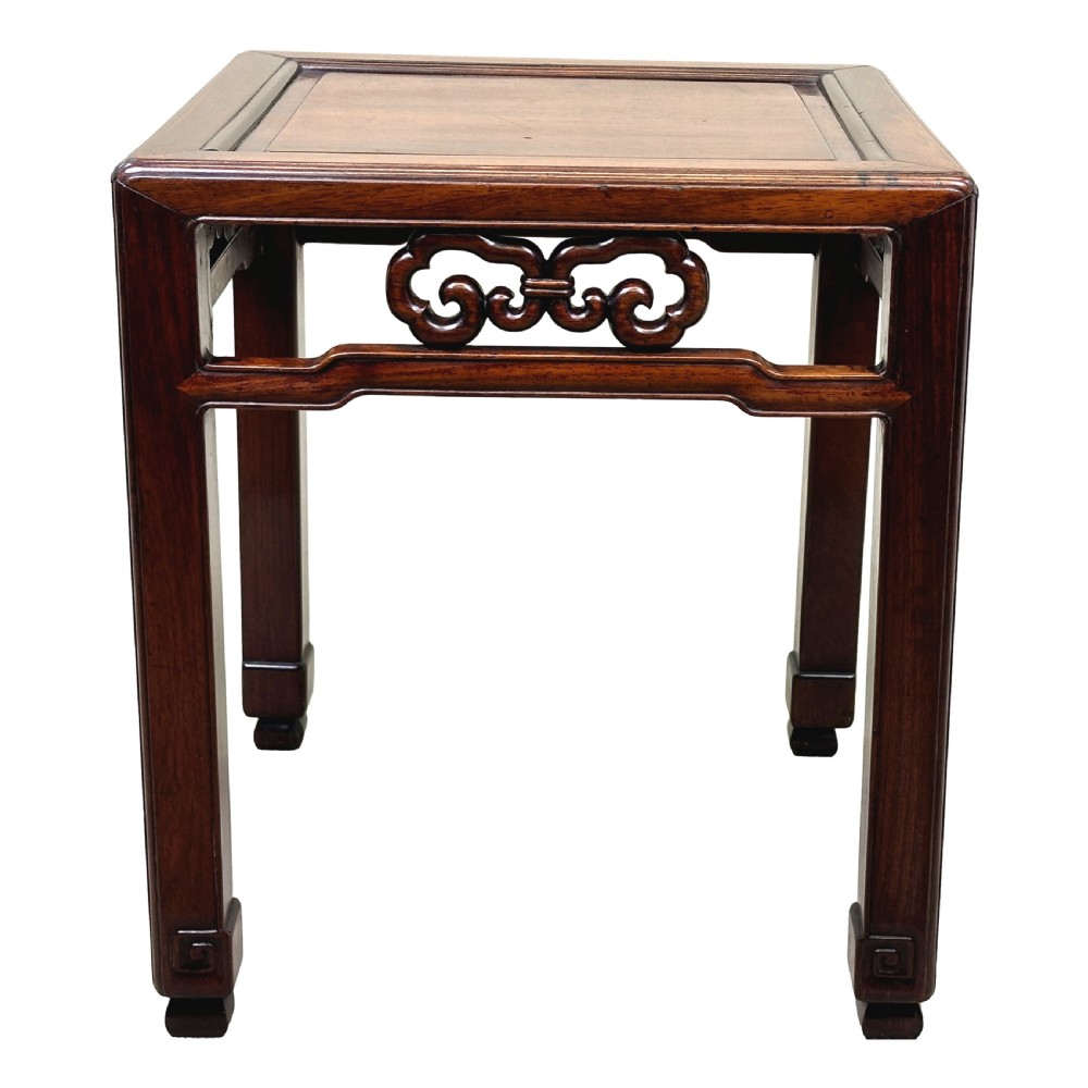 A dark brown square oriental hardwood side table featuring carved scrollwork aprons and straight legs with carved feet. View IV