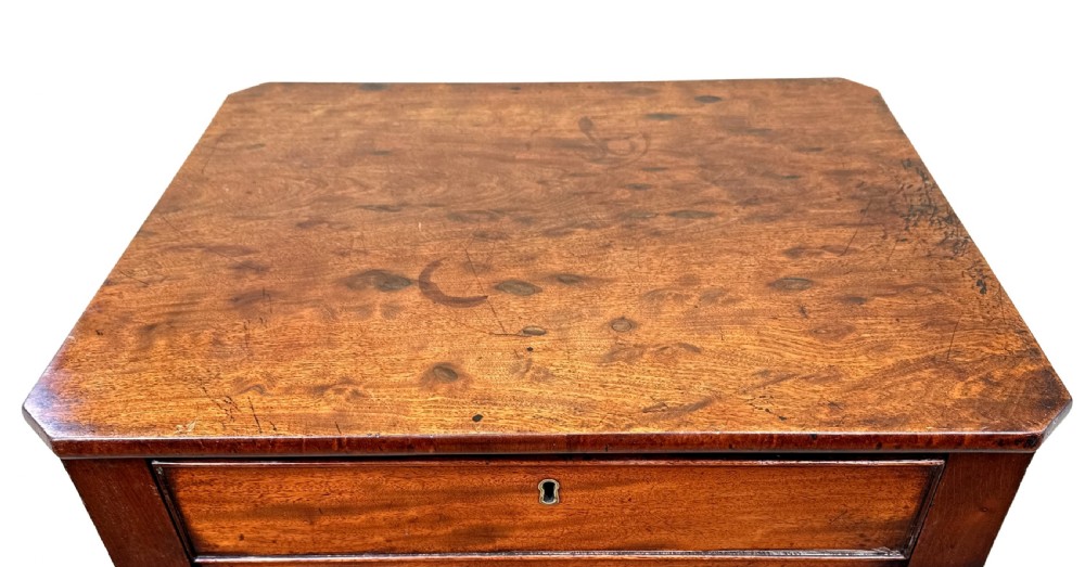 A Georgian mahogany side table featuring a rectangular top with a single drawer, supported by a central turned pedestal stem and a tripod base. View V