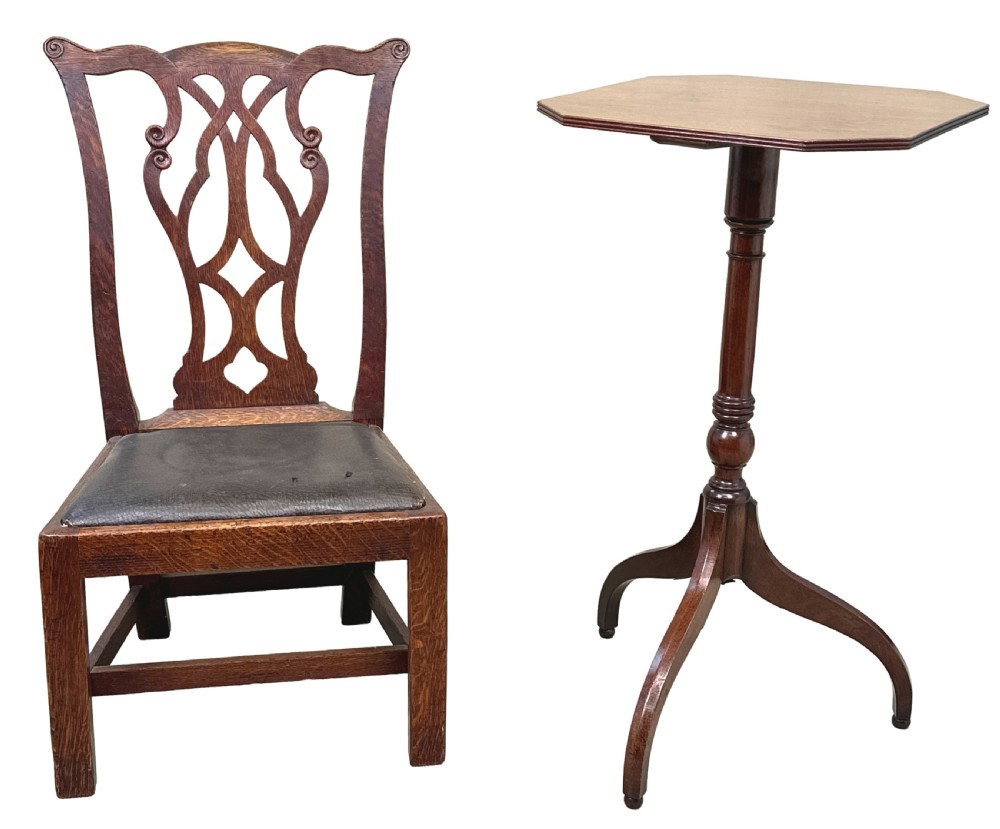 A 19th-century Georgian style childs chair crafted in dark oak with a pierced fretwork back splat and a dark leather drop-in seat. View IX