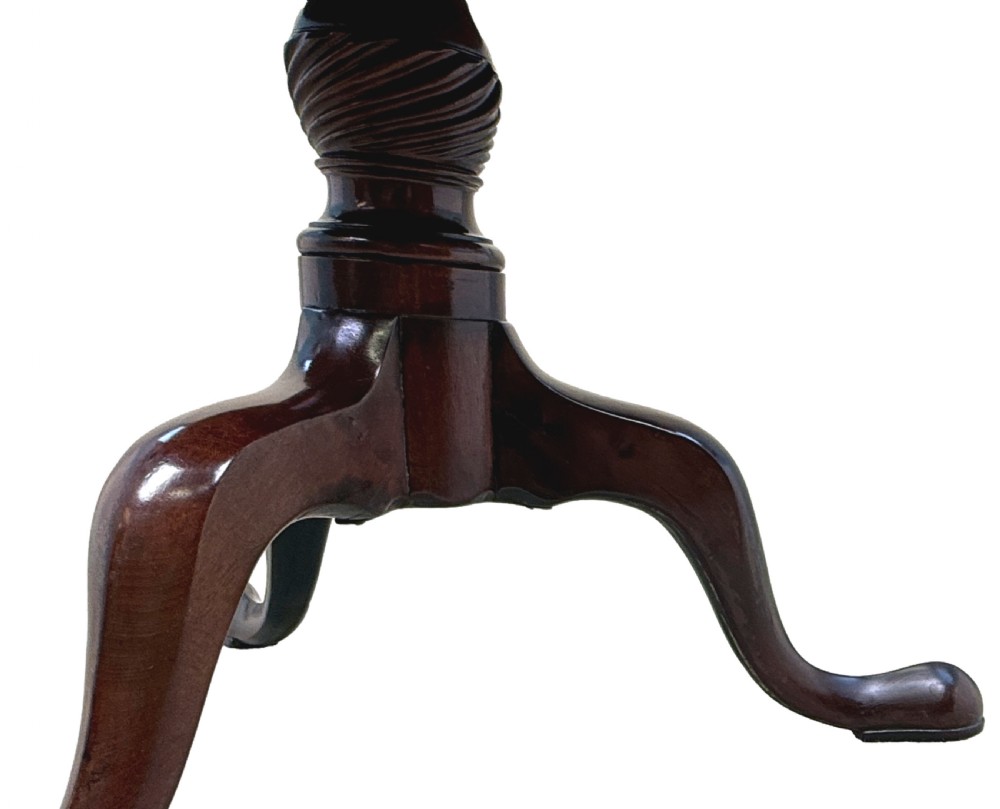 An 18th-century Georgian dark mahogany two-tier dumbwaiter featuring spiral turned details and a tripod base with cabriole legs. View IV