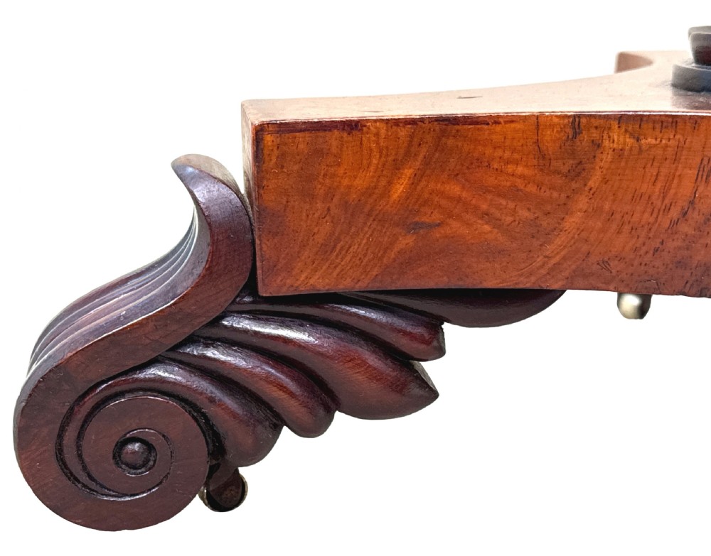 A nineteenth-century octagonal specimen wood occasional table featuring a geometric inlaid tabletop supported by a turned column and carved base. View III