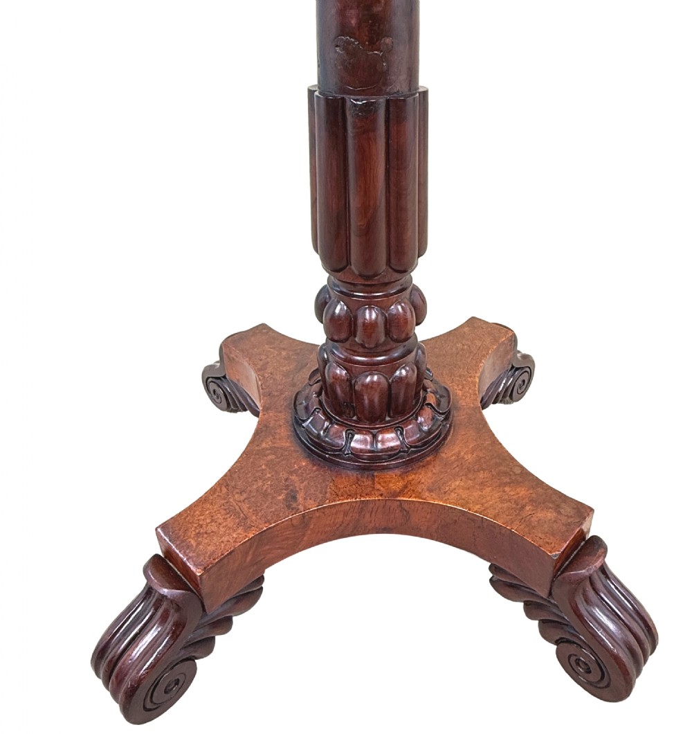 A nineteenth-century octagonal specimen wood occasional table featuring a geometric inlaid tabletop supported by a turned column and carved base. View V