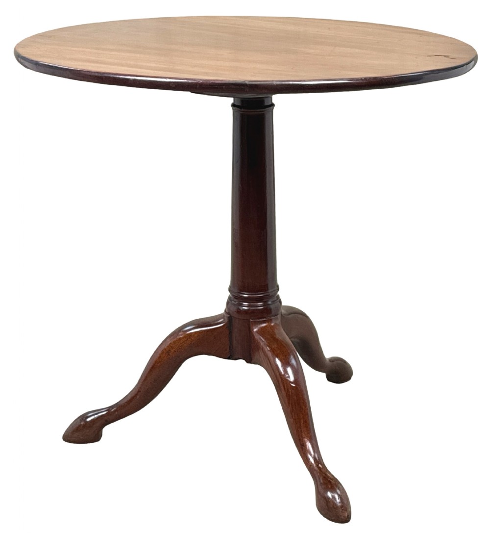 An 18th-century Georgian mahogany tripod table featuring a circular top supported by a central turned column and three splayed legs. View IV