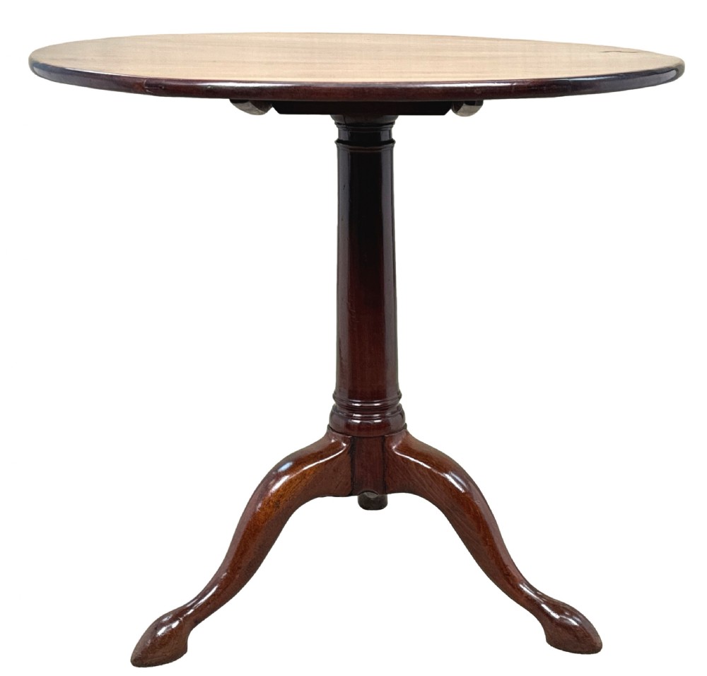 An 18th-century Georgian mahogany tripod table featuring a circular top supported by a central turned column and three splayed legs. View XII