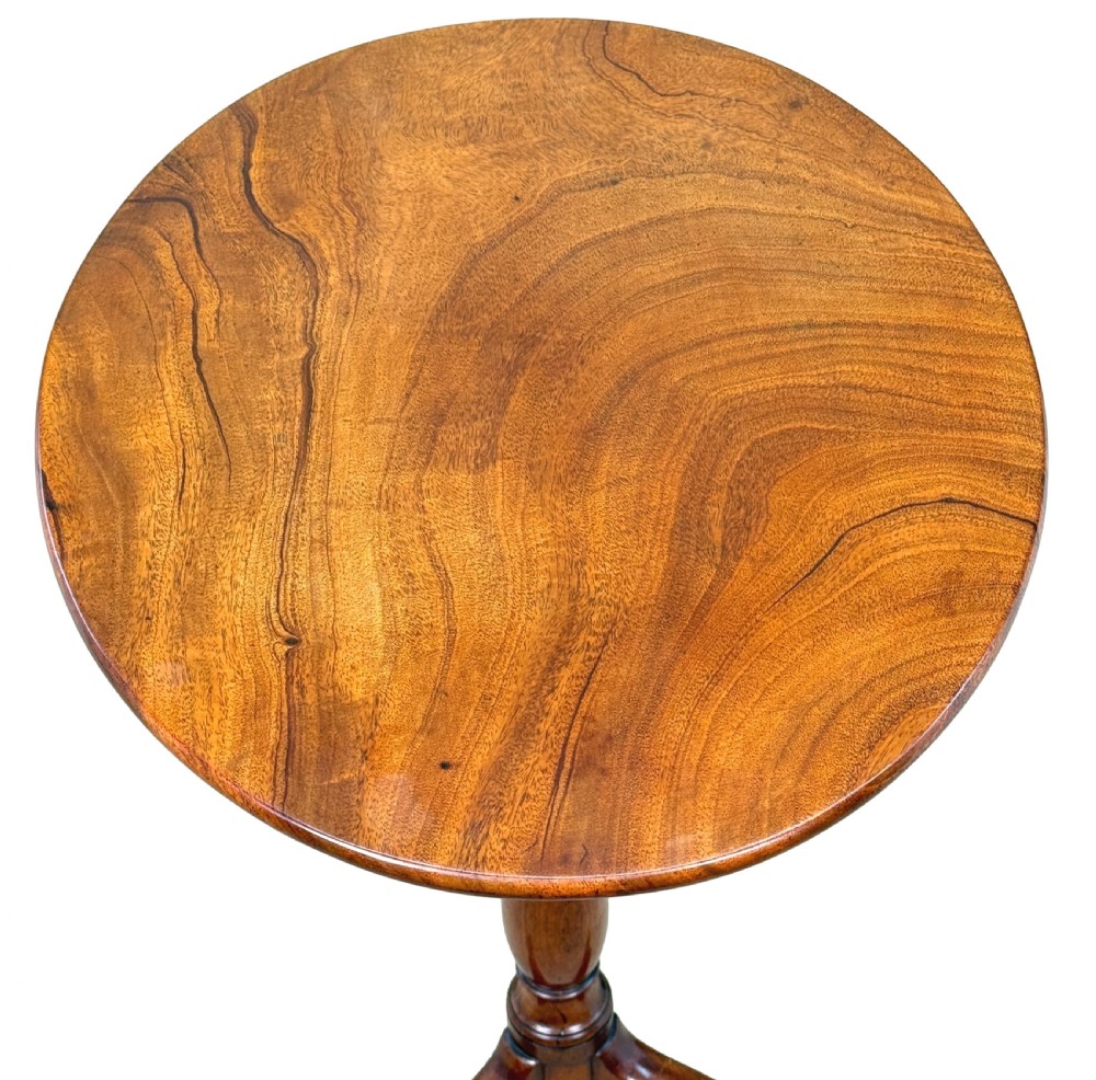 An 18th-century Georgian mahogany wine table featuring a smooth oval top, a turned central pedestal column, and tripod pad feet. View III