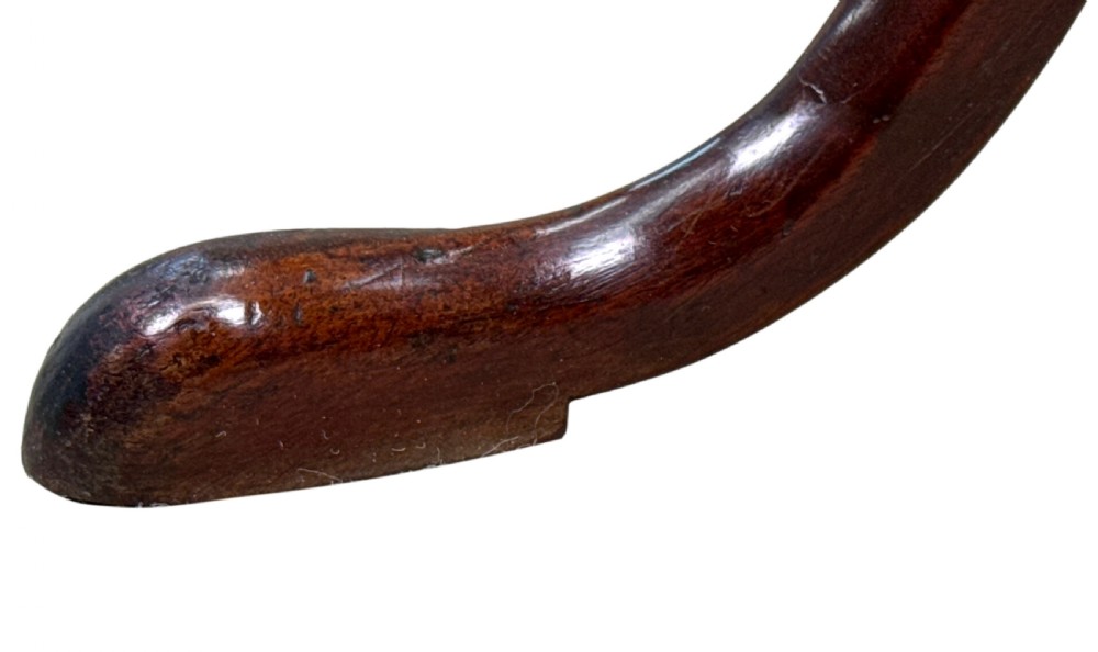 An 18th-century Georgian mahogany wine table featuring a smooth oval top, a turned central pedestal column, and tripod pad feet. View VIII