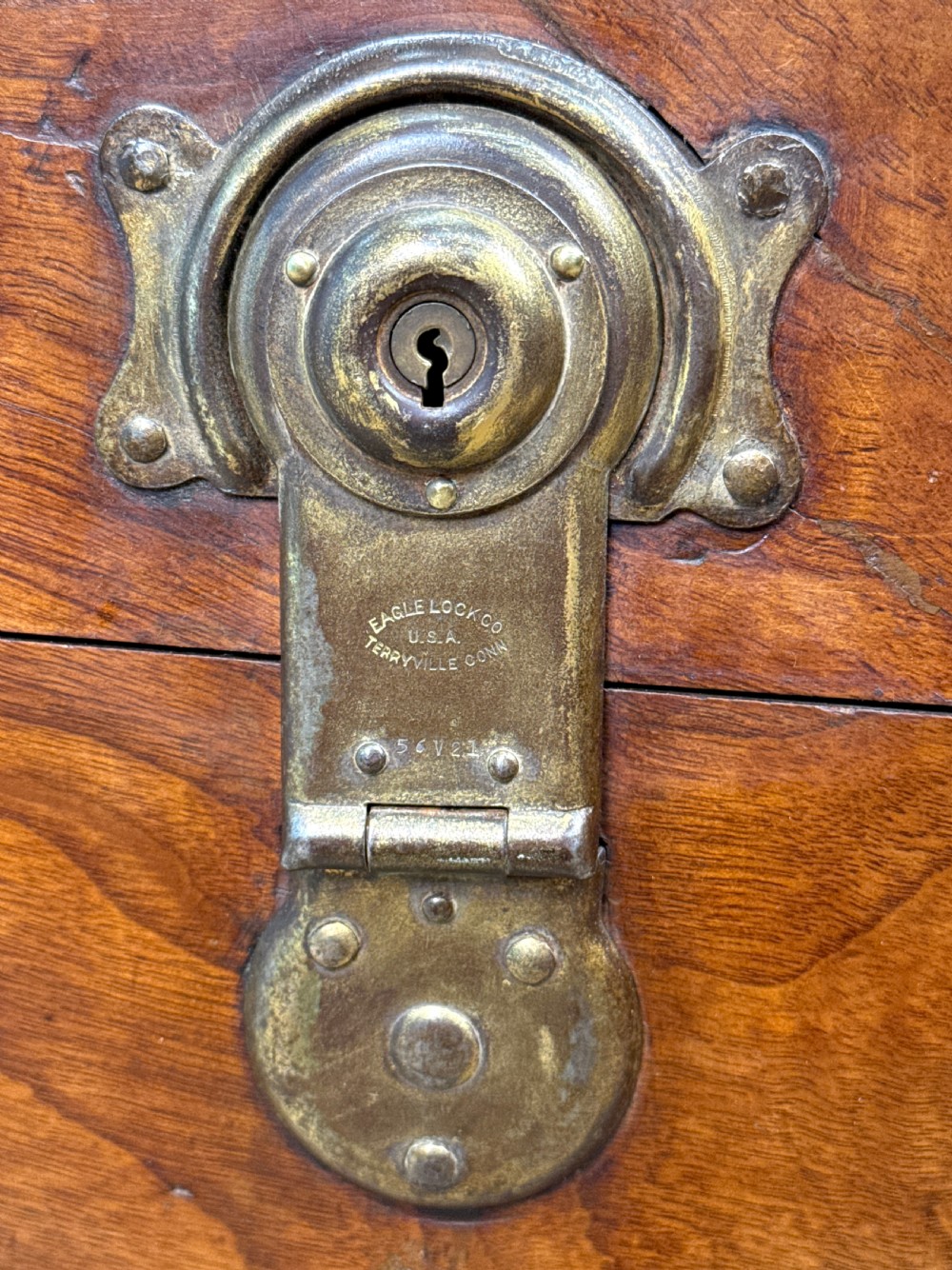 A large nineteenth-century camphor wood campaign trunk featuring brass corner mounts, heavy latches, and exposed dovetail joints. View III