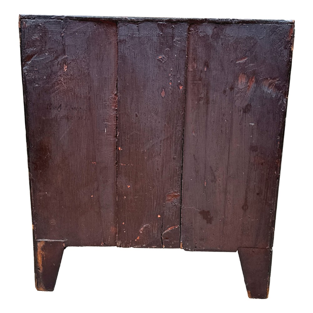 A Victorian miniature mahogany bowfront chest featuring two short over two long drawers with turned wooden knobs and bracket feet. View VIII