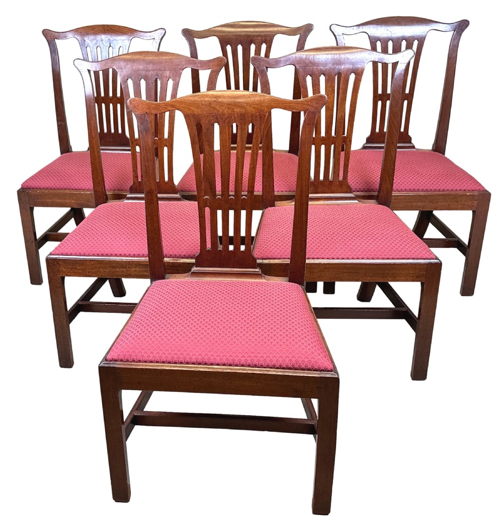 A set of six Chippendale period mahogany dining chairs with vertical slat splat backs, straight legs, and red textured upholstered seats. View XII