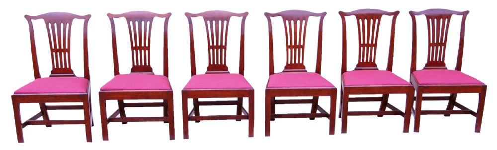 A set of six Chippendale period mahogany dining chairs with vertical slat splat backs, straight legs, and red textured upholstered seats. View XIII