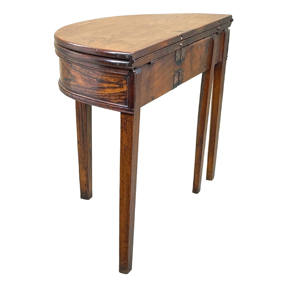 A Georgian elm demi-lune tea table displaying rich wood grain, a fold-over top, and square tapered legs. View VI
