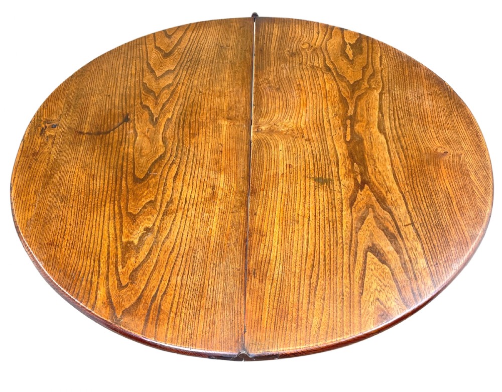 A Georgian elm demi-lune tea table displaying rich wood grain, a fold-over top, and square tapered legs. View VIII