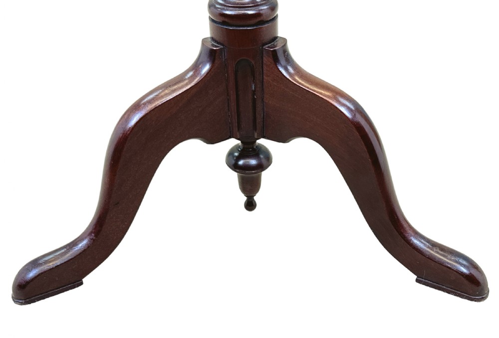 An 18th-century mahogany torchere stand featuring a circular dished top, a slender fluted stem, and a tripod base. View II