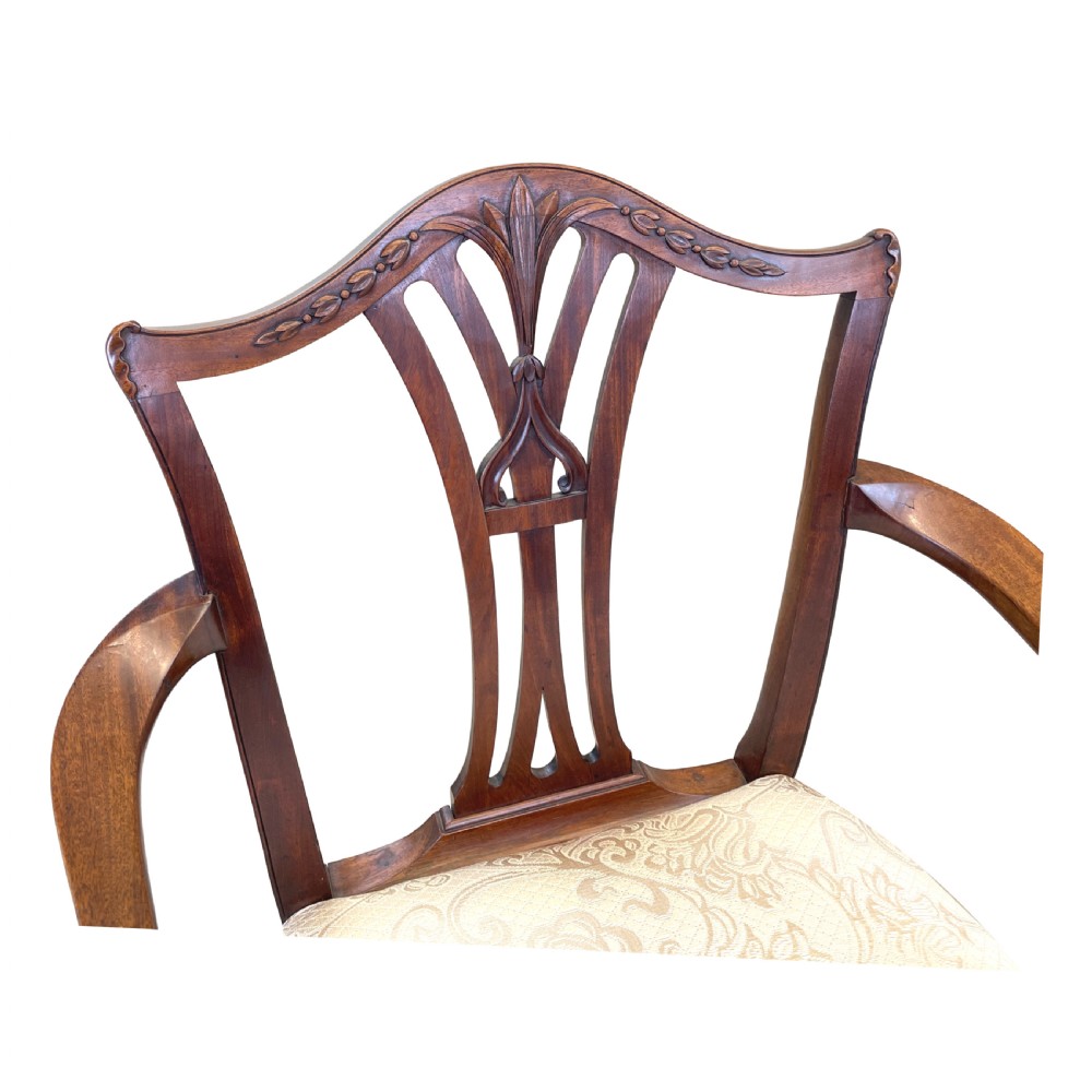 An 18th-century Georgian carved mahogany open armchair with a pierced back splat and cream patterned upholstered seat. View VI