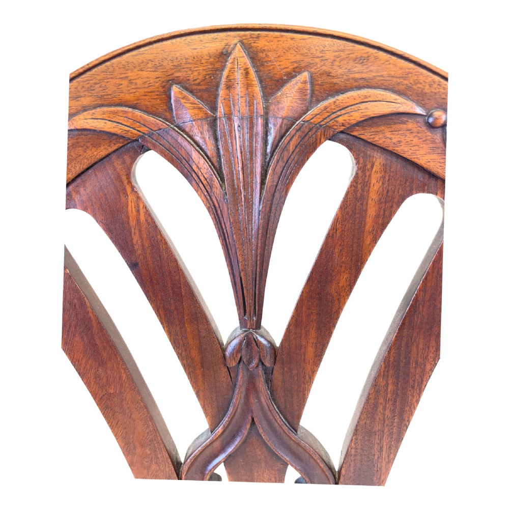 An 18th-century Georgian carved mahogany open armchair with a pierced back splat and cream patterned upholstered seat. View XI