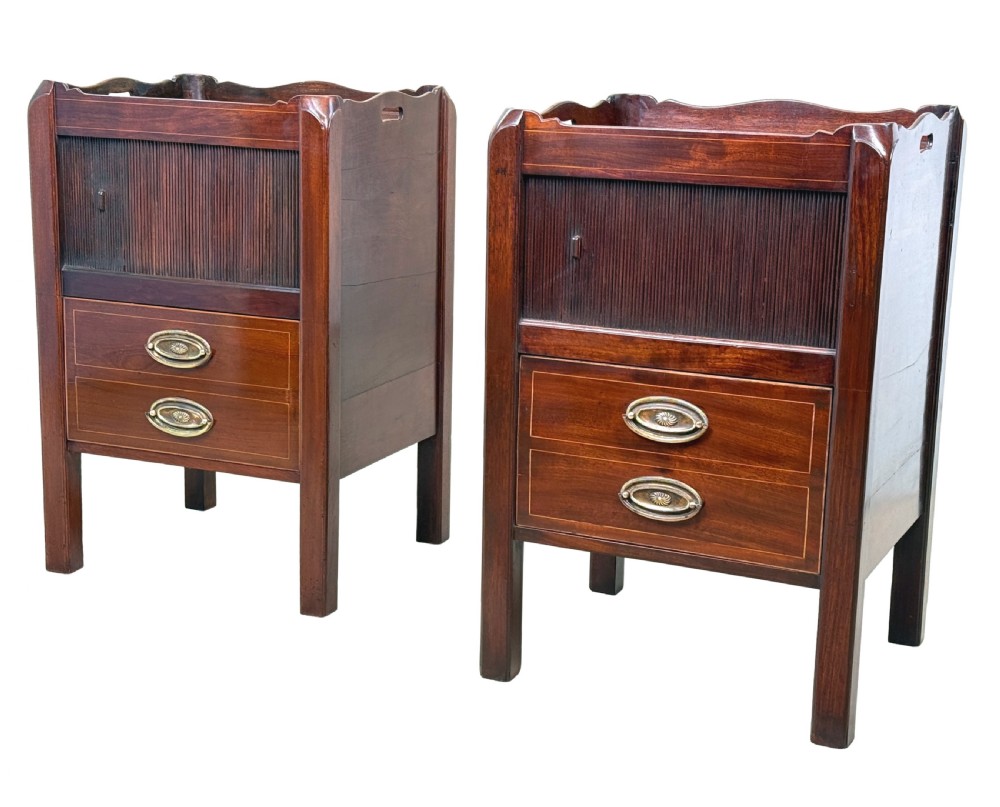 A matching pair of 18th-century mahogany bedside tables featuring gallery tops with side handles, slatted tambour doors, and drawers with brass oval handles and fine inlay.