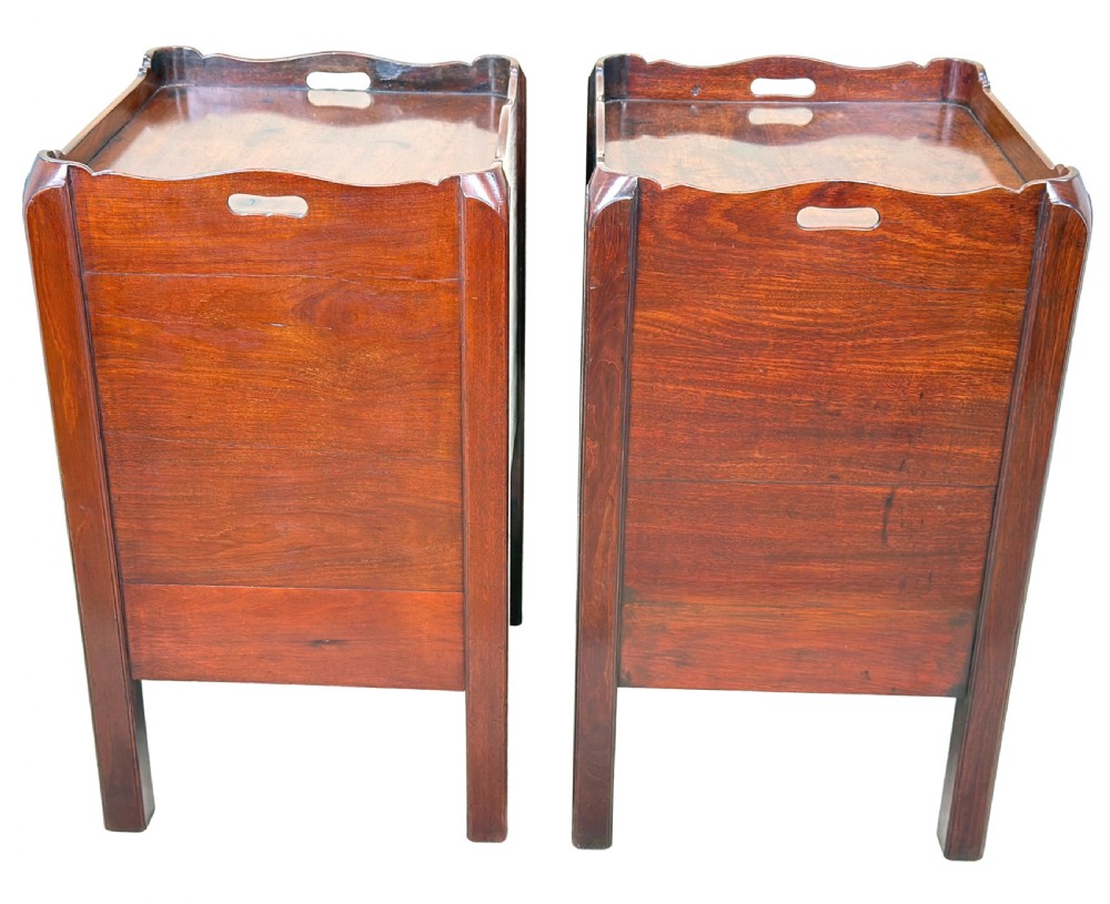 A matching pair of 18th-century mahogany bedside tables featuring gallery tops with side handles, slatted tambour doors, and drawers with brass oval handles and fine inlay. View VIII