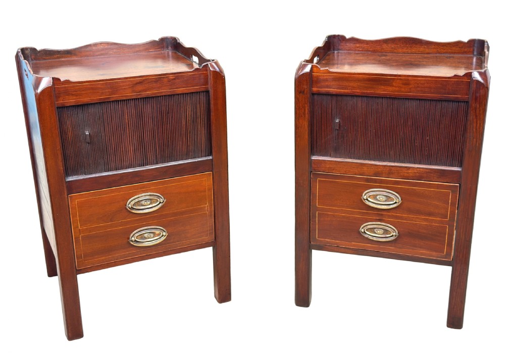 A matching pair of 18th-century mahogany bedside tables featuring gallery tops with side handles, slatted tambour doors, and drawers with brass oval handles and fine inlay. View IX