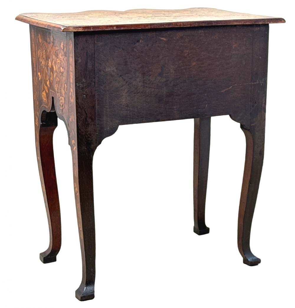 An 18th-century walnut lowboy side table decorated with intricate floral marquetry, featuring four drawers, a shaped apron with a drop finial, and cabriole legs. View XII