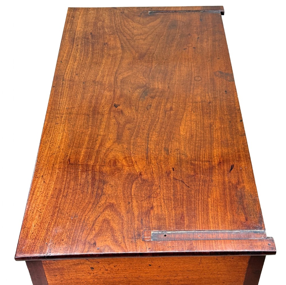An 18th-century Georgian mahogany display cabinet featuring astragal glazed upper doors above a writing desk base with drawers and tapered legs. View IX