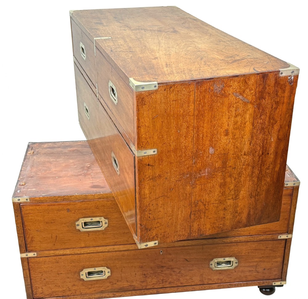 A nineteenth-century camphor wood military campaign chest of drawers featuring flush brass handles, corner brackets, and turned bun feet. View XV