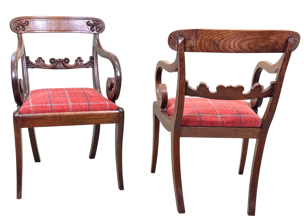 A pair of Regency mahogany carver armchairs featuring scrolled arms, carved back rails, and red plaid upholstered drop-in seats. View II