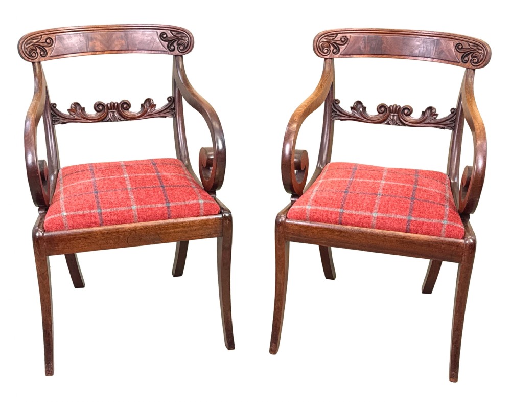 A pair of Regency mahogany carver armchairs featuring scrolled arms, carved back rails, and red plaid upholstered drop-in seats. View XII