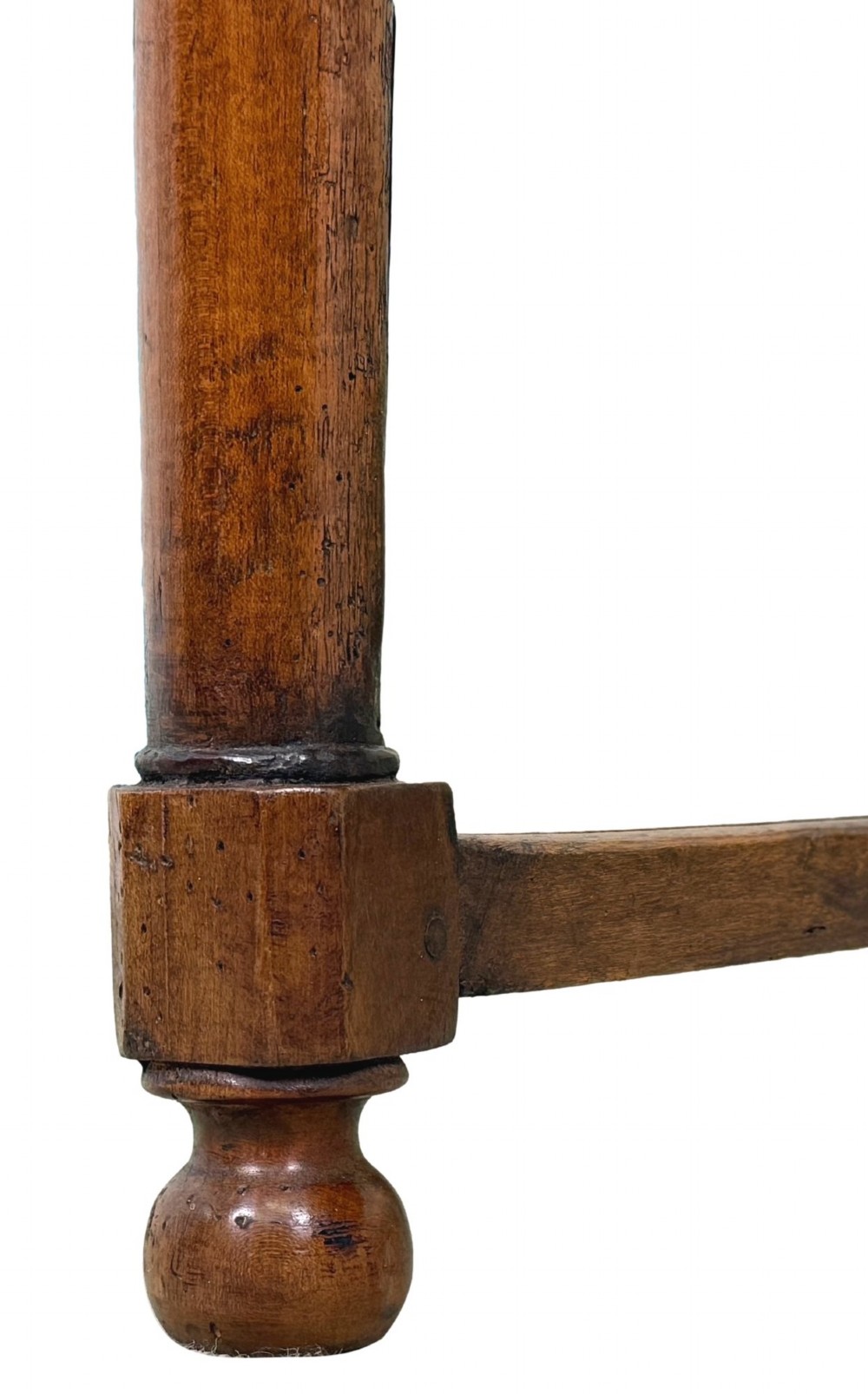 A 19th-century French Provincial fruitwood farmhouse table featuring a rectangular plank top, single end drawer, turned legs, and lower side stretchers. View XI