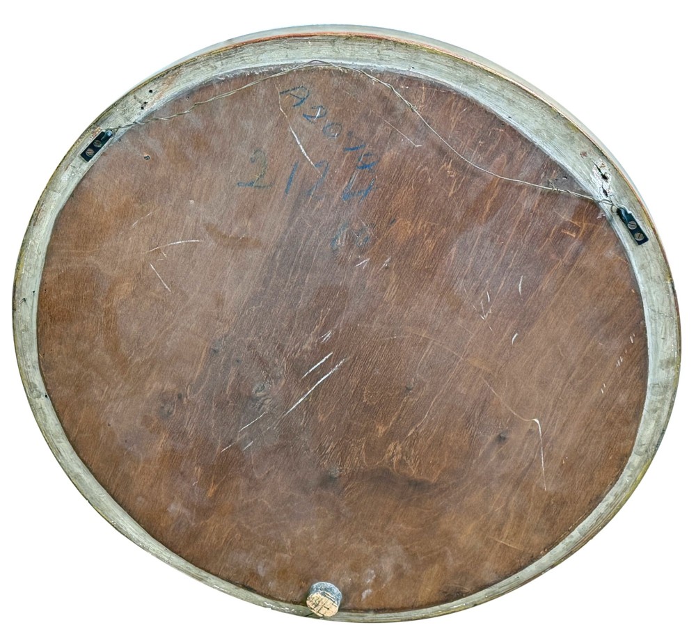 A mid-19th century circular convex mirror featuring a moulded giltwood frame with carved leaf clasps and an inner ebonised reeded slip. View IX