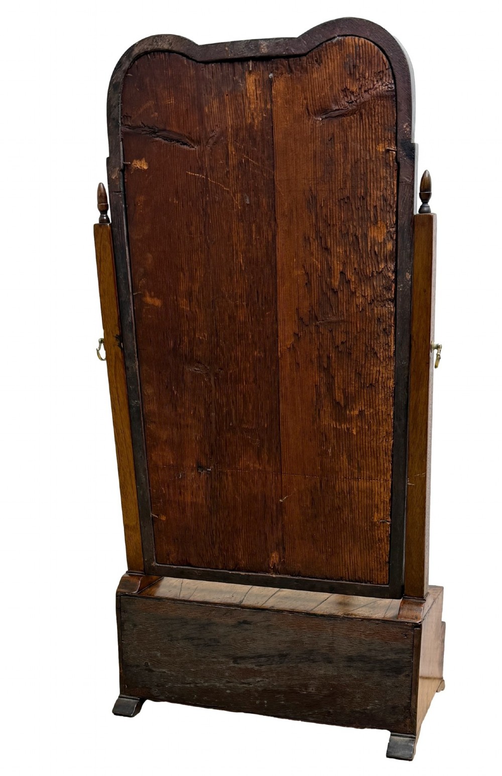 A Queen Anne early 18th-century walnut dressing table mirror featuring an arched swing frame resting above a stepped serpentine base with small drawers and brass hardware. View XIV