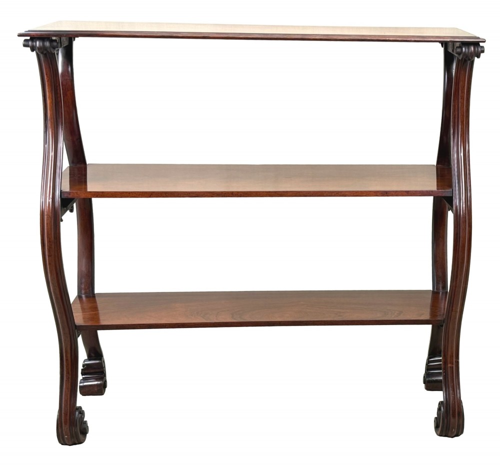 A mid-19th century three-tier rosewood standing buffet unit featuring curved leg supports and carved scroll details. View VII