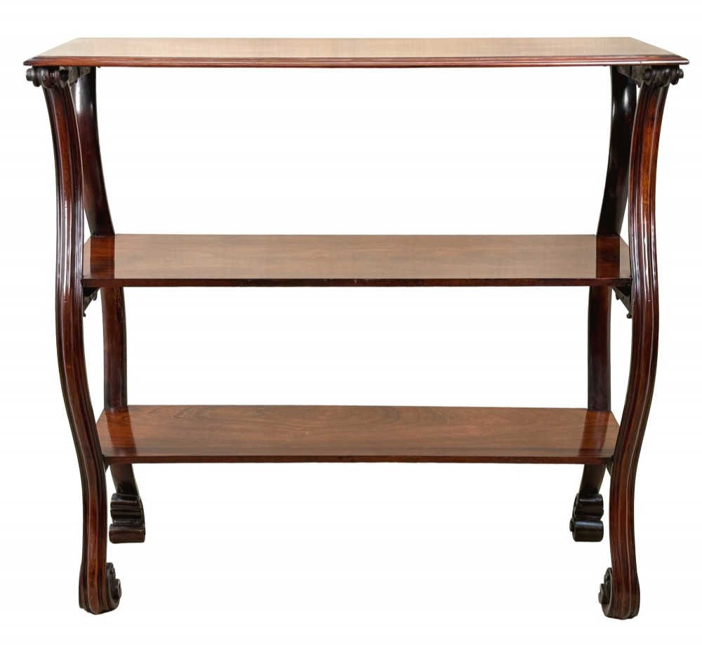 A mid-19th century three-tier rosewood standing buffet unit featuring curved leg supports and carved scroll details. View XIV