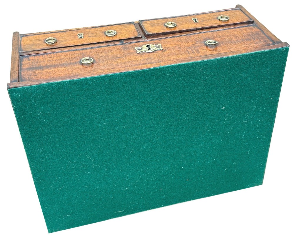 An 18th-century Georgian mahogany book carrier featuring a curved wooden top handle, a rear wire mesh panel, shaped side galleries, and three small drawers fitted with brass drop ring handles. View VIII