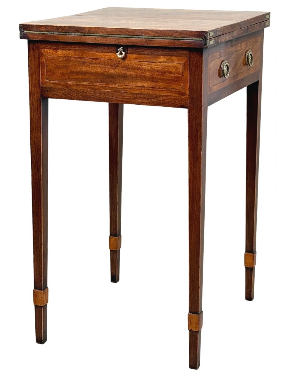An 18th-century Georgian mahogany patience table featuring a folding top, brass corner brackets, a single drawer with ring handles, and square tapered legs. View II