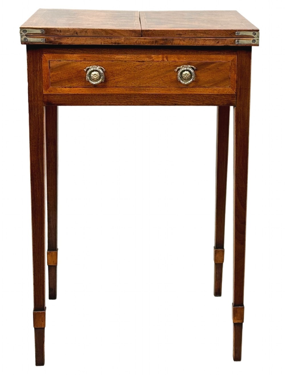 An 18th-century Georgian mahogany patience table featuring a folding top, brass corner brackets, a single drawer with ring handles, and square tapered legs. View VI