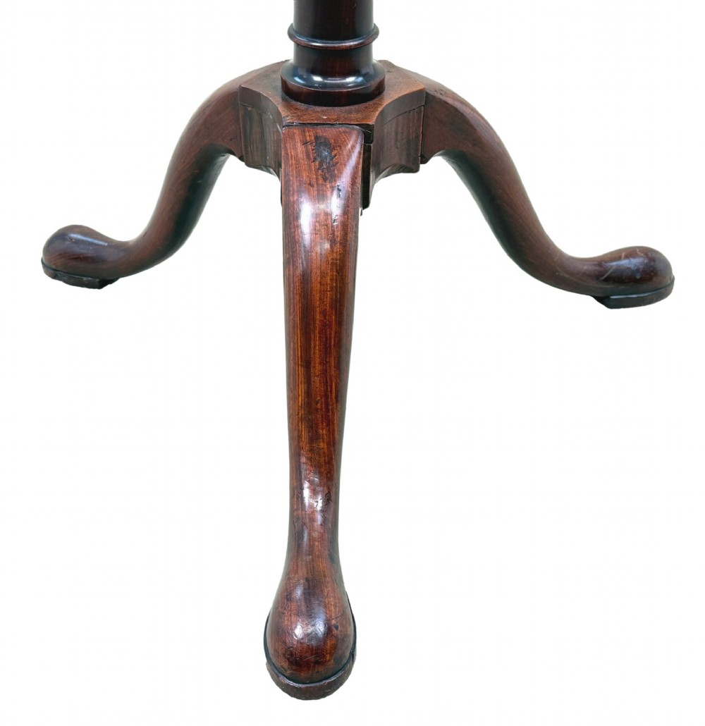 An 18th-century Georgian mahogany torchere stand featuring an octagonal tray top with raised gallery, a turned column, and a tripod base. View VII