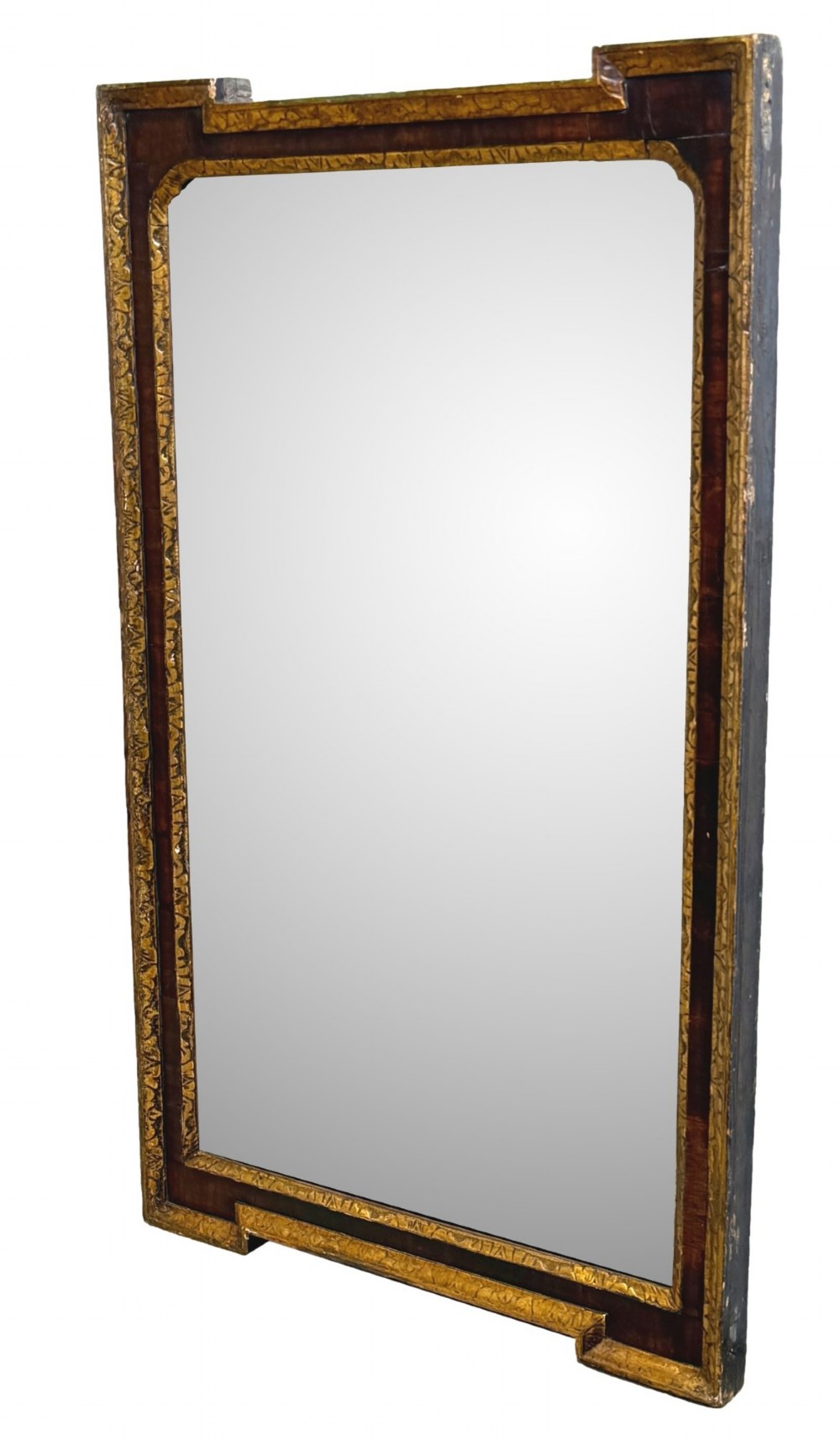 An early 18th-century rectangular wall mirror featuring a dark walnut frame bordered with gilded leaf mouldings and stepped projecting corners.