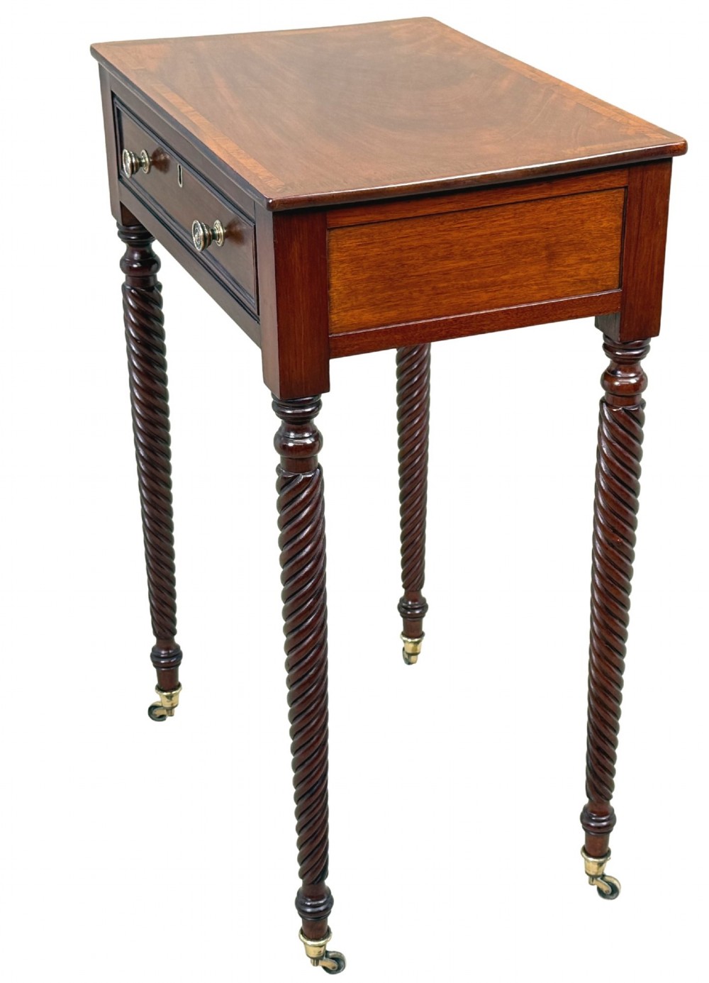 A 19th-century Regency mahogany occasional table featuring a single drawer with brass knobs, spiral turned legs, and brass castors. View V