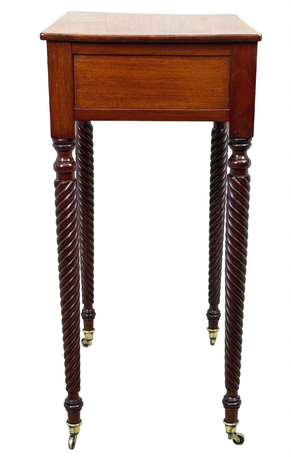 A 19th-century Regency mahogany occasional table featuring a single drawer with brass knobs, spiral turned legs, and brass castors. View VII