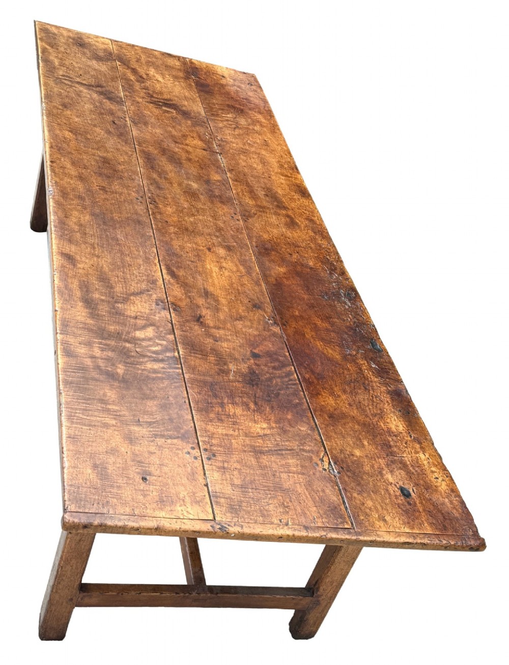 An 18th-century English farmhouse dining table crafted from warm brown oak with a wide three-plank top, plain apron, and an H-stretcher base. View VII