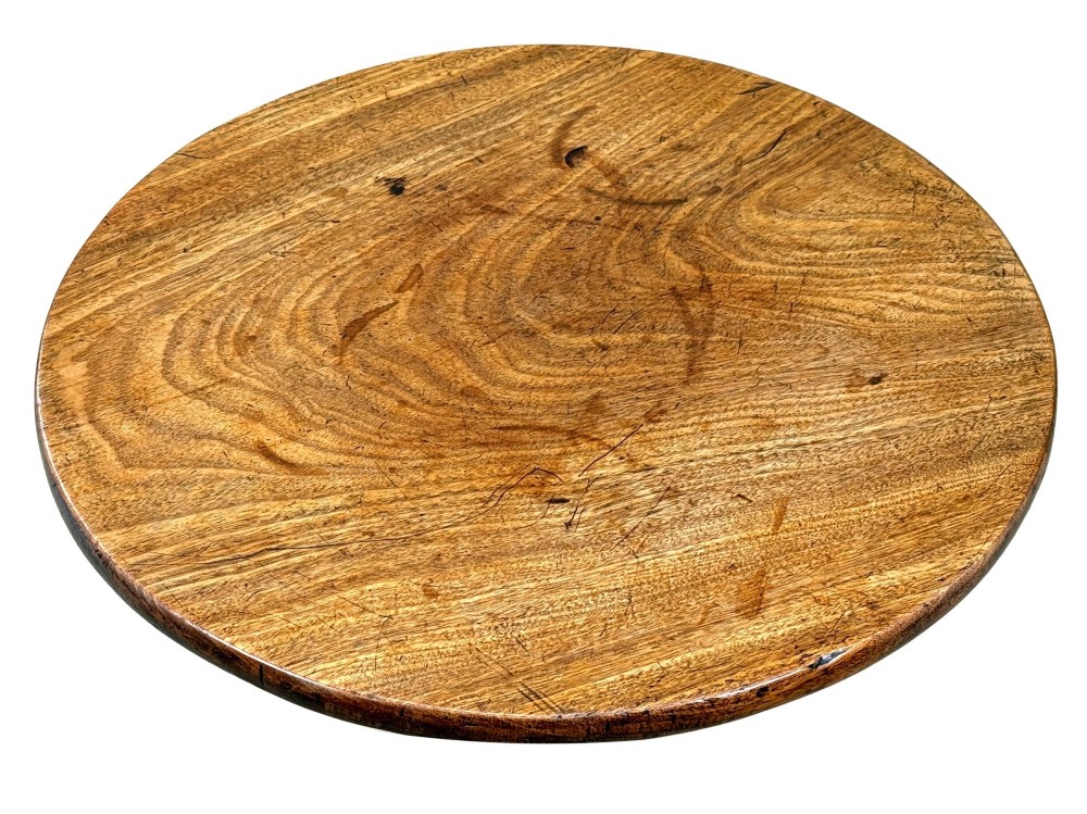 An 18th-century Georgian mahogany wine table featuring a flat circular top supported by a turned central column and three slender cabriole tripod legs. View II