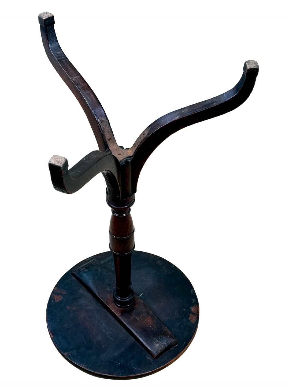 An 18th-century Georgian mahogany wine table featuring a flat circular top supported by a turned central column and three slender cabriole tripod legs. View IX