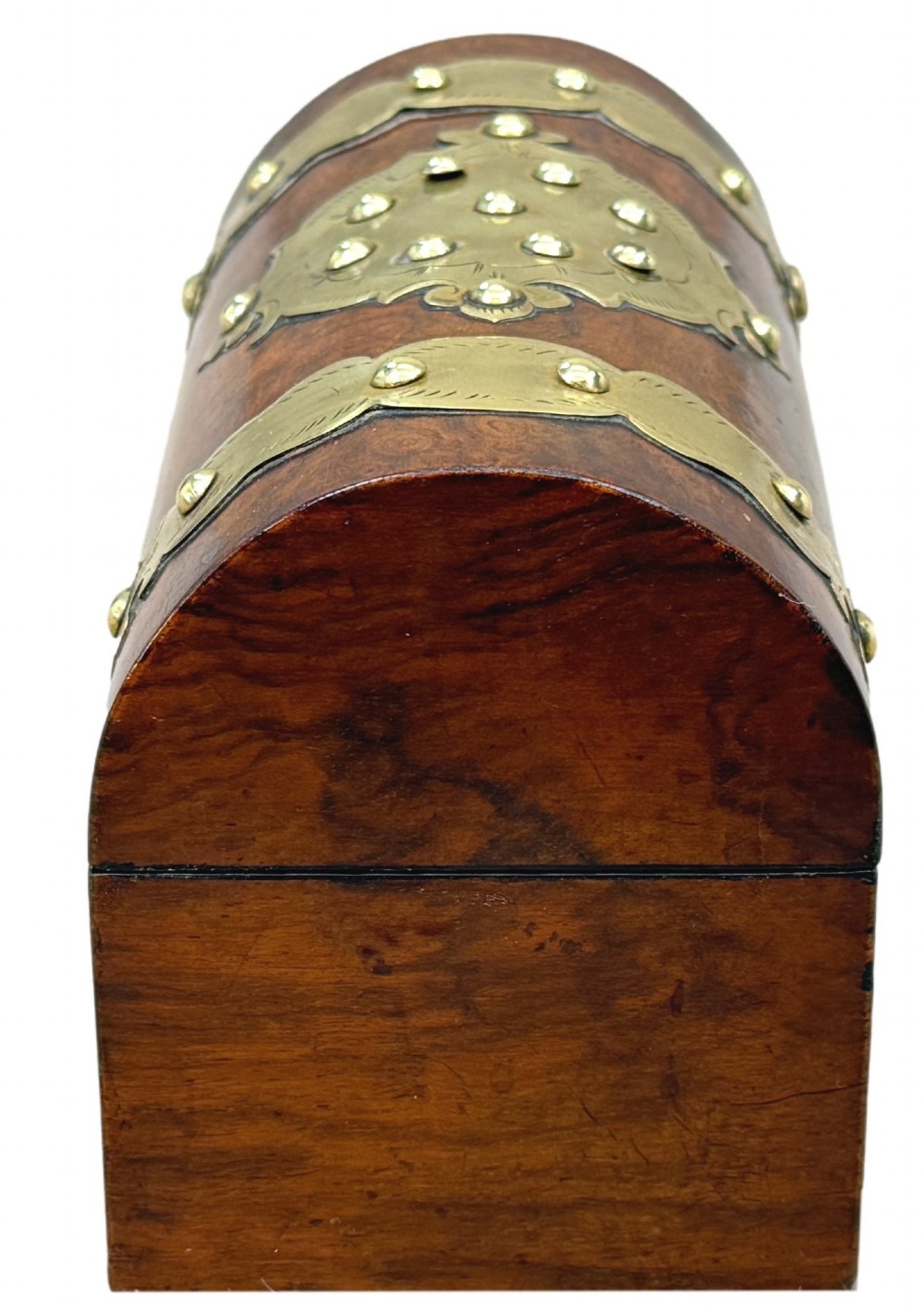 A nineteenth-century domed stationery box crafted from highly figured burr walnut with ornamental brass strapwork and studs. View IV