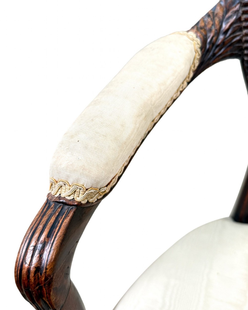 An 18th-century Georgian mahogany salon chair featuring an oval back rest, carved wooden frame, and cream silk upholstery. View V