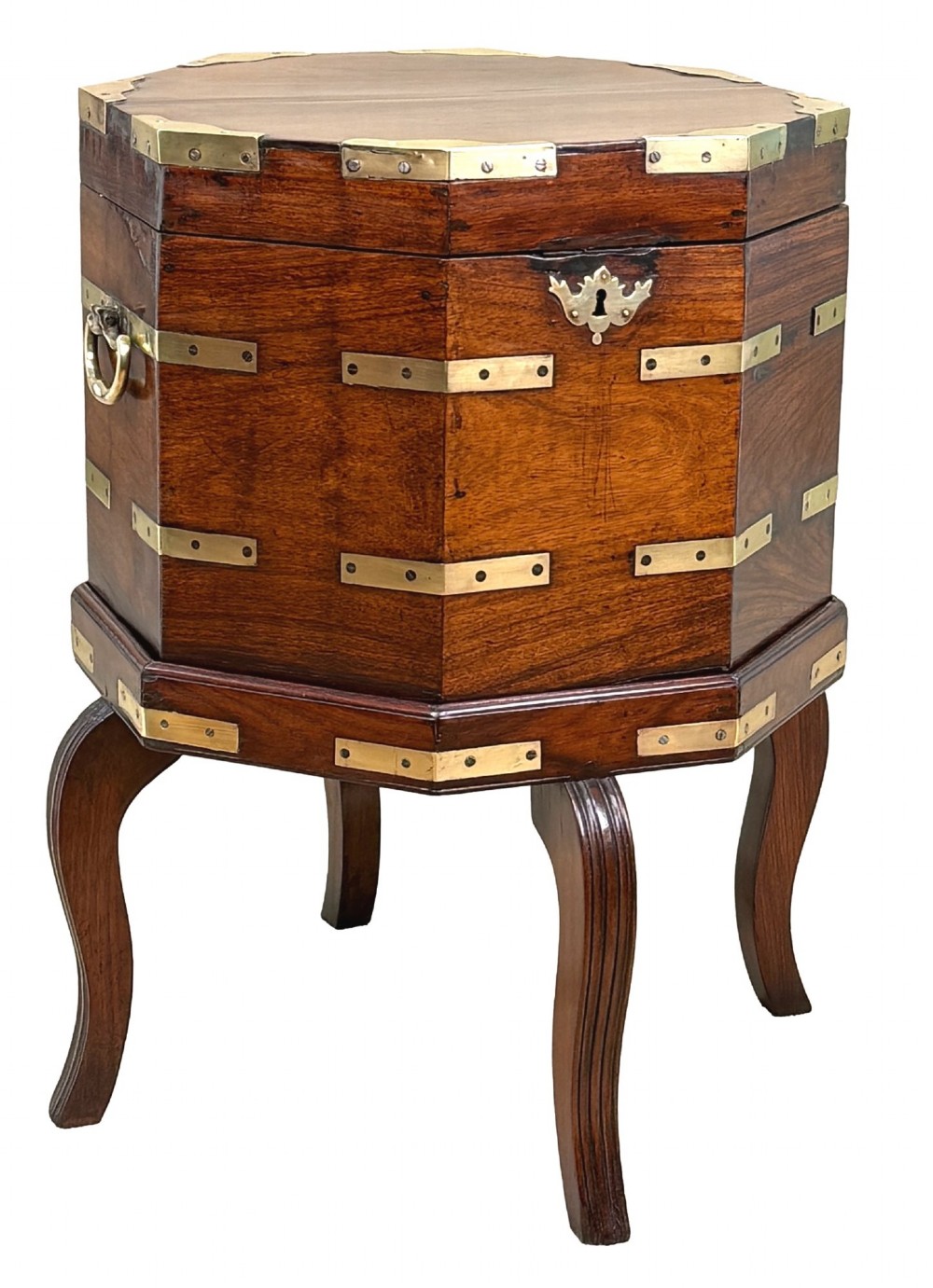 An octagonal eighteenth-century Anglo-Indian padouk wood cellarette with brass corner straps, keyhole escutcheon, and carrying handles, supported on four cabriole legs. View VIII