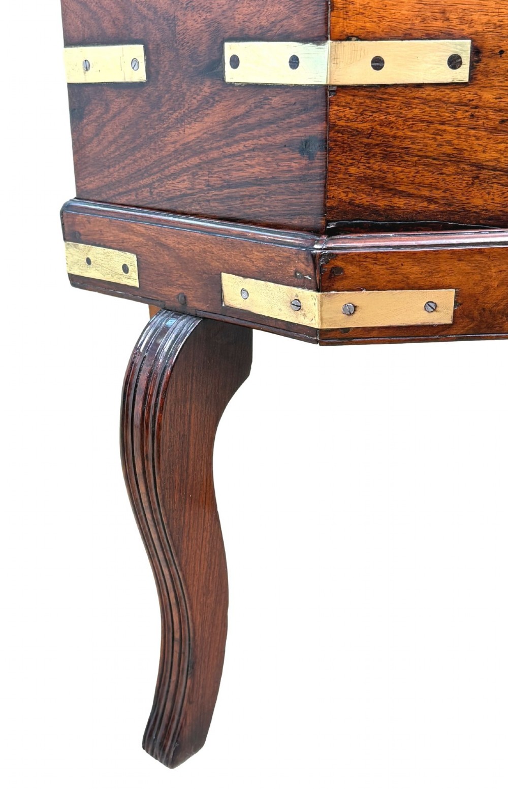 An octagonal eighteenth-century Anglo-Indian padouk wood cellarette with brass corner straps, keyhole escutcheon, and carrying handles, supported on four cabriole legs. View IX