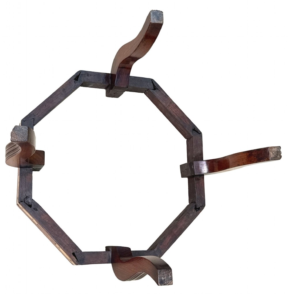 An octagonal eighteenth-century Anglo-Indian padouk wood cellarette with brass corner straps, keyhole escutcheon, and carrying handles, supported on four cabriole legs. View XIII
